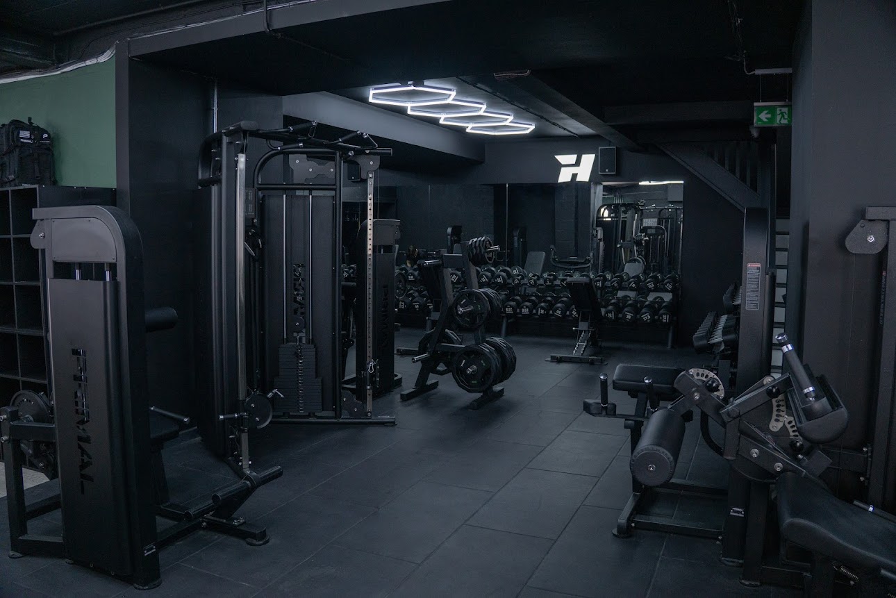 Hype Gym main floor with dumbbell rack and cable machines